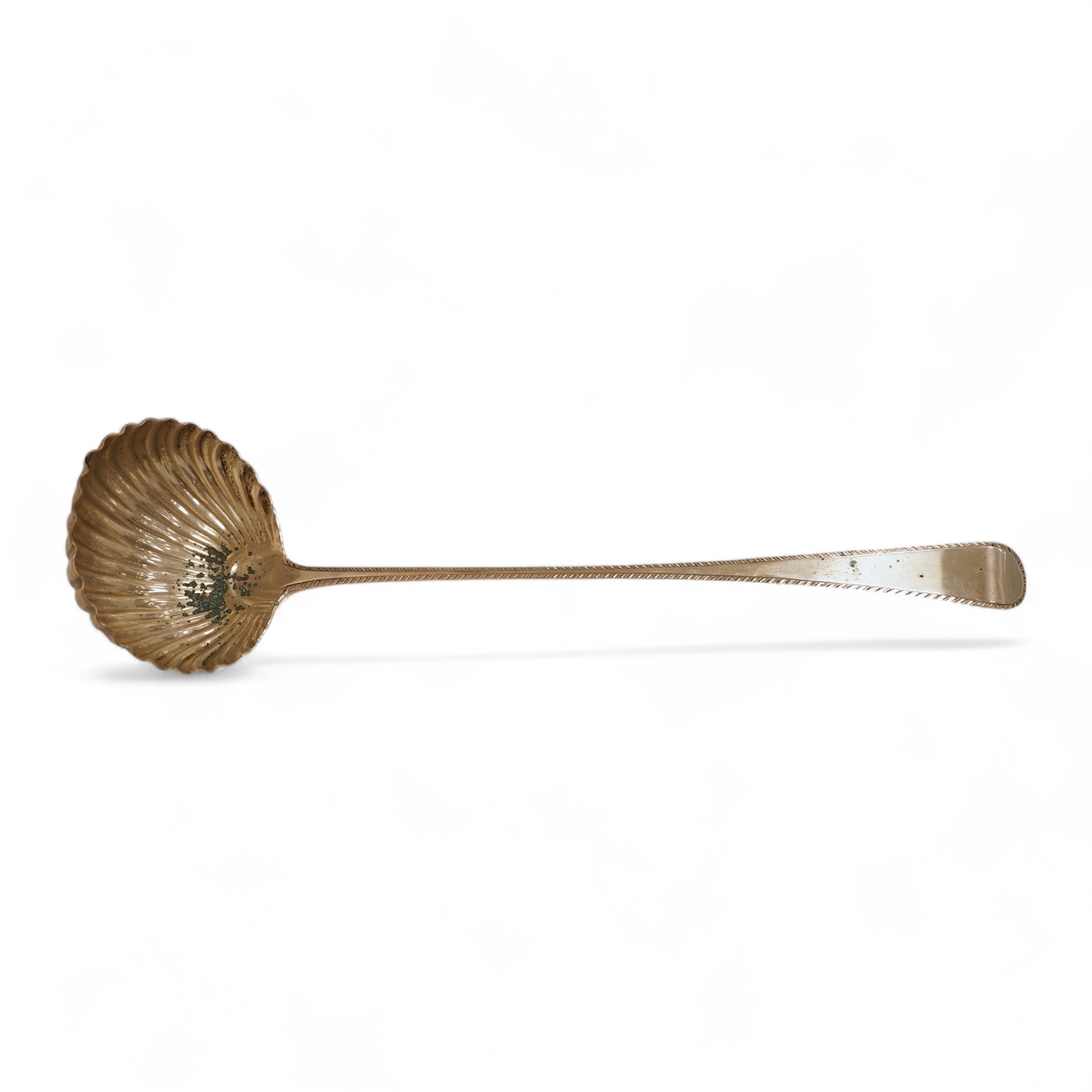 A late George II silver feather edge Old English pattern soup ladle, with fluted bowl, by Richard Rugg, London, 1759, 34cm, 5oz.